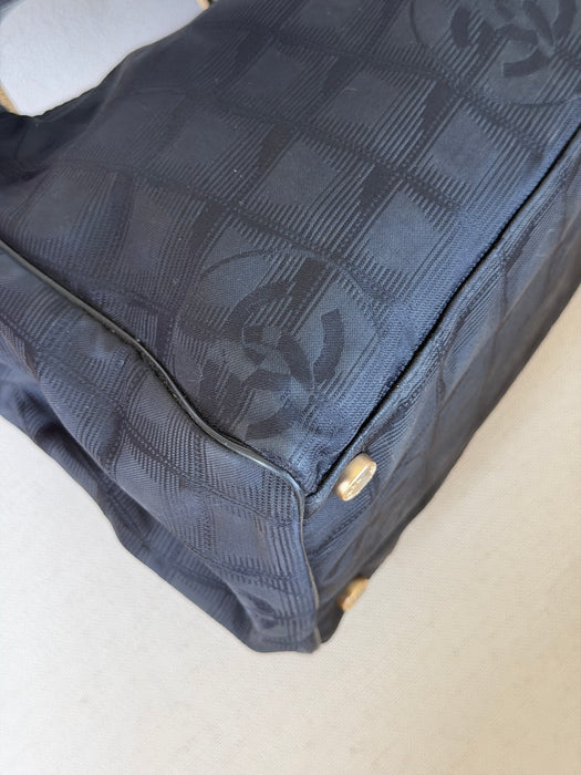 Chanel Traveline Boston