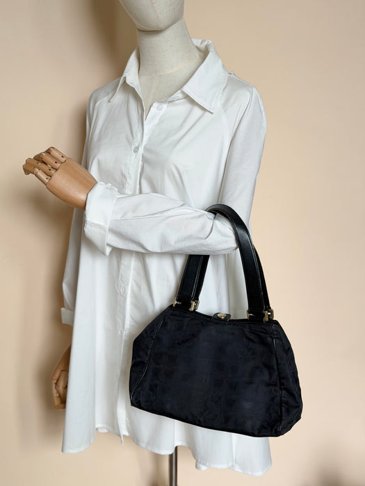 Chanel Traveline Boston