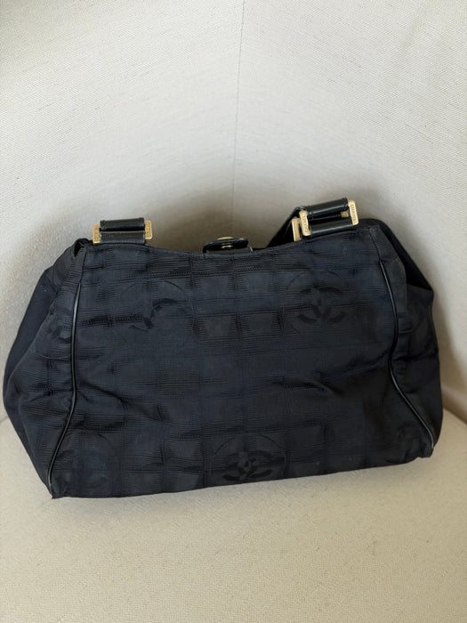 Chanel Traveline Boston