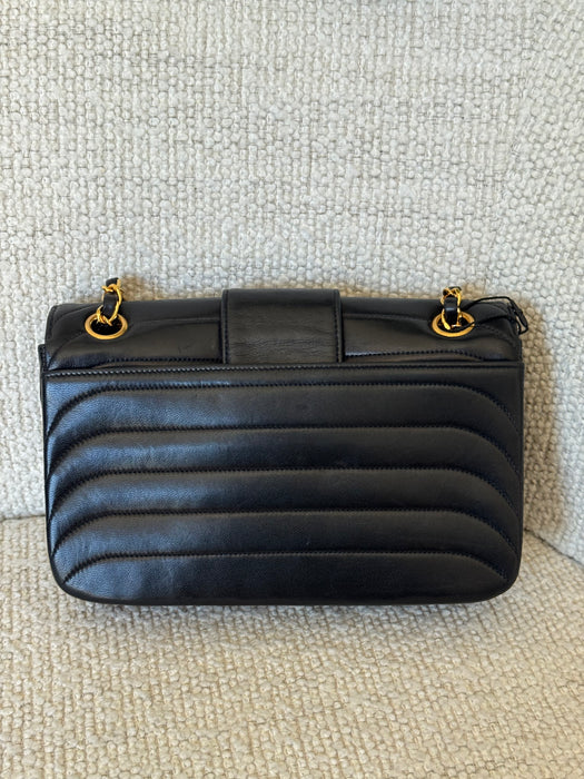 Chanel vertical mademoiselle double flap